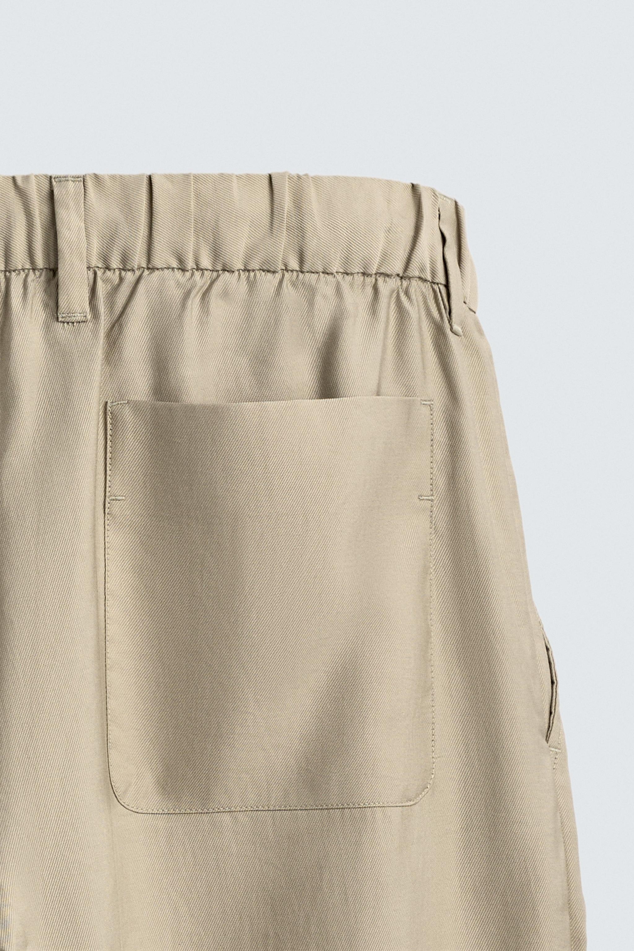FLOWY PLEATED PANTS